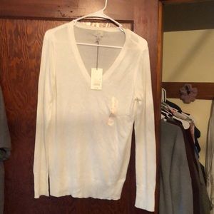 Cream long sleeved sweater
